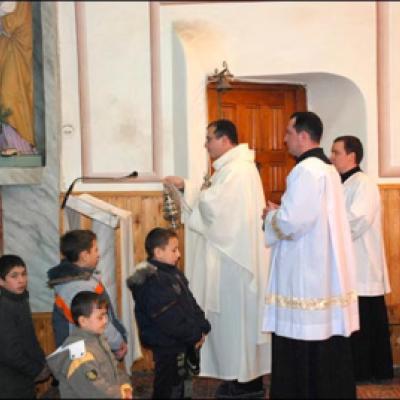26 decembrie 2009: Iugani: Vizita episcopului Aurel Percă