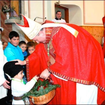 26 decembrie 2009: Iugani: Vizita episcopului Aurel Percă